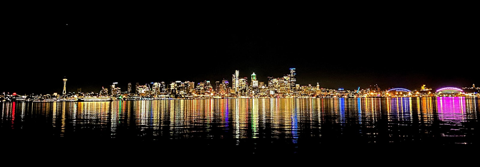 city skyline during night time