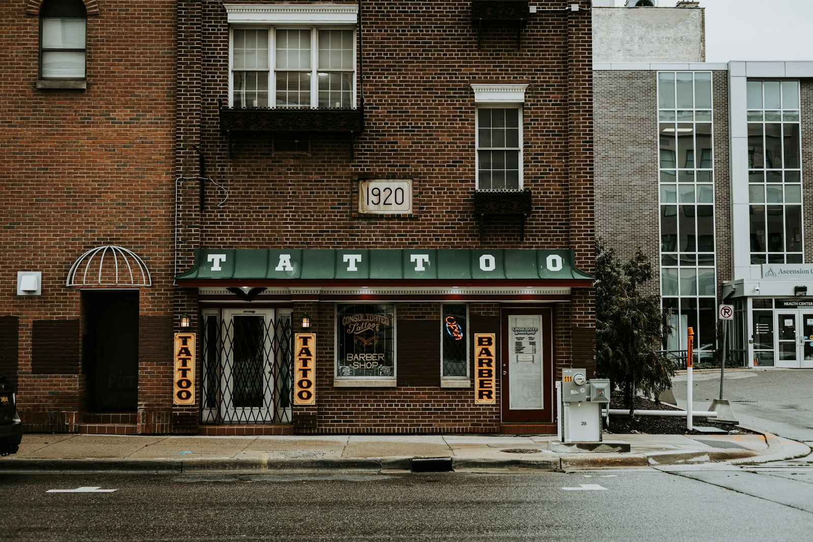 a brick building with a sign on it