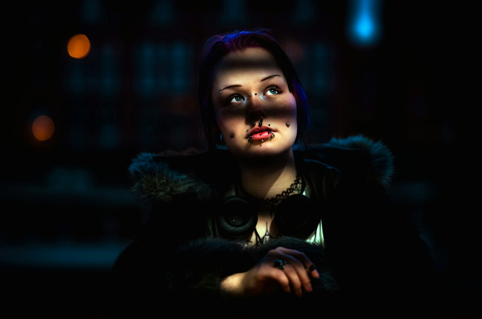 Young woman with striped shadows on face
