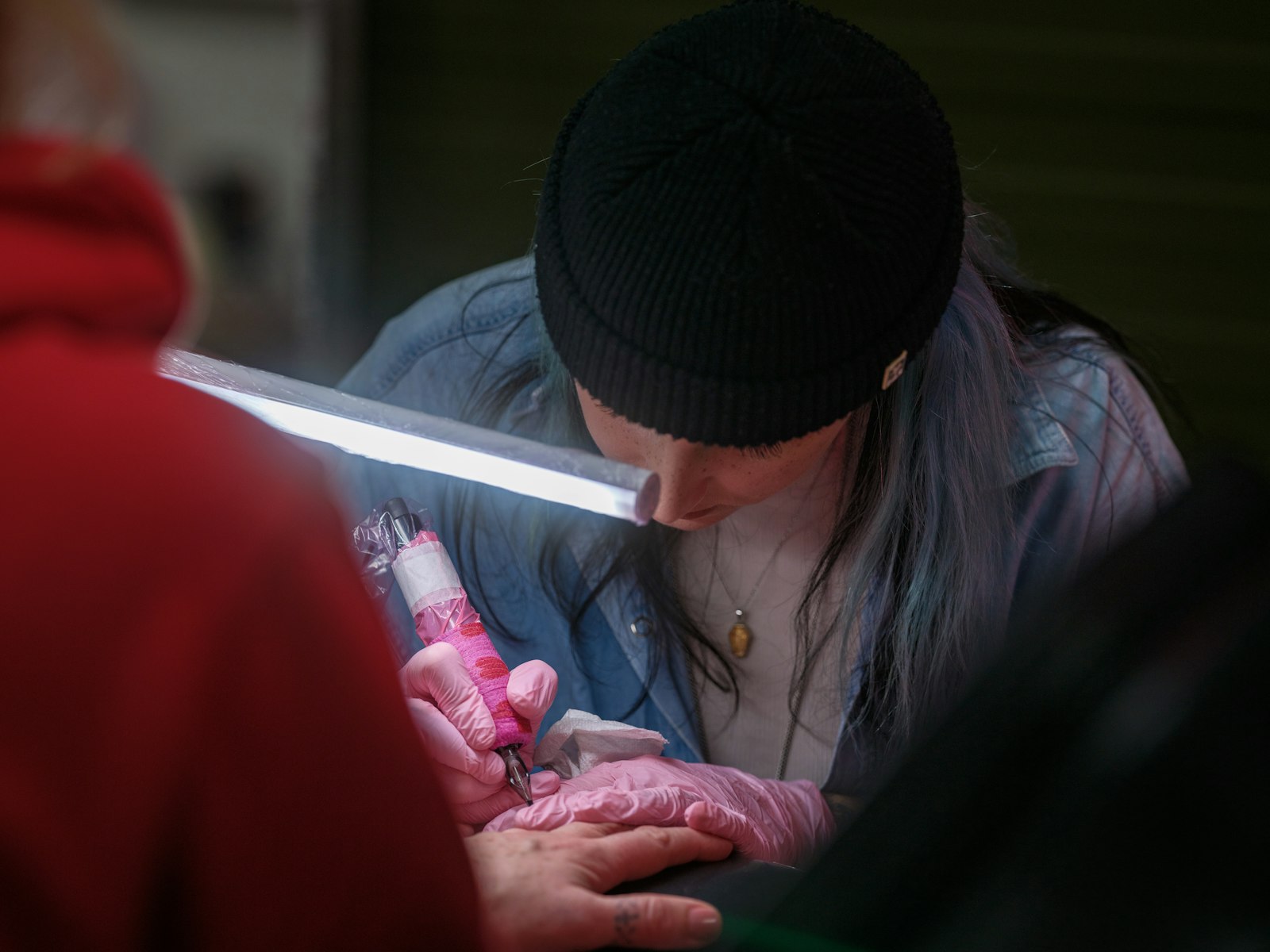 A woman holding a baby in her arms